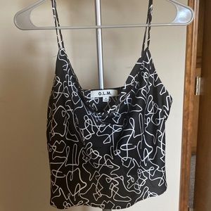A black and white tank top! Barely worn and soft in material!